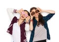 Happy pretty teenage girls with donuts having fun Royalty Free Stock Photo