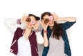 Happy pretty teenage girls with donuts having fun Royalty Free Stock Photo