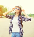 Happy pretty young woman wearing a sunglasses and hat Royalty Free Stock Photo