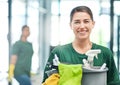 Happy, product and portrait of a woman with a cleaning service, tools and bucket for work. Smile, office and a young Royalty Free Stock Photo