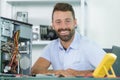 happy professional man repairing and assembling computer Royalty Free Stock Photo