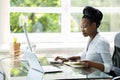 Happy Professional Woman Employee Using Computer