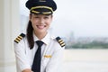 Portrait of a pretty female pilot smiling Royalty Free Stock Photo