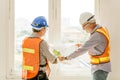 Happy professional worker working together home builder architecture mix race in construction site Royalty Free Stock Photo