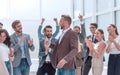 Happy project Manager accepting congratulations of his colleagues Royalty Free Stock Photo