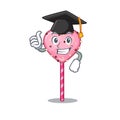 Happy and proud of candy heart lollipop wearing a black Graduation hat Royalty Free Stock Photo