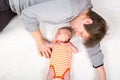 Happy proud young father with newborn baby daughter, family portrait togehter Royalty Free Stock Photo