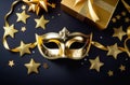 Happy Purim carnival composition. golden mask, gift box and confetti on black background, flatlay