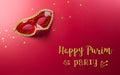 Happy Purim carnival decoration concept made from golden mask star and glitter on red background.