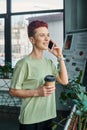 happy queer person with coffee to Royalty Free Stock Photo