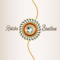 Happy raksha bandhan celebration greeting with creative rakhi on white background