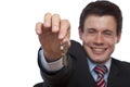 Happy Real estate agent overgives house key Royalty Free Stock Photo