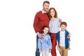 happy red haired family with two kids standing together and smiling at camera Royalty Free Stock Photo