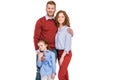 happy redhead family with one kid standing together and smiling at camera Royalty Free Stock Photo