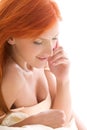 Happy redhead woman with cell phone Royalty Free Stock Photo