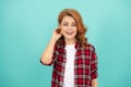 happy redhead woman with curly hair in checkered casual shirt, style