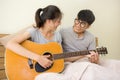 Happy relationship couple lovely activity. Asian lover using freetime on holiday together at home.