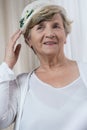 Happy retired woman in boater Royalty Free Stock Photo