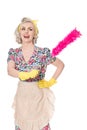 Happy retro housewife, with feather duster, on white