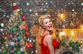 Happy retro woman celebrate Merry Christmas. Beautiful New Year and Christmas scene. Wish you merry Christmas. Surprised Royalty Free Stock Photo