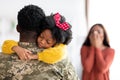 Happy Reunion. Excited Family Welcoming Soldier Father At Home After Army Royalty Free Stock Photo