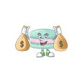 Happy rich vanilla blue macarons mascot design carries money bags