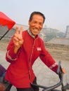 Happy rickshaw driver