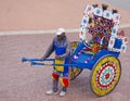 Happy rickshaw driver poses Royalty Free Stock Photo