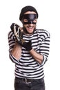 Happy robber holding stolen jewelry Royalty Free Stock Photo