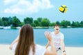 Happy romantic couple playing with soccer ball in summer Royalty Free Stock Photo