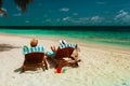 Happy romantic couple relax on a tropical beach Royalty Free Stock Photo