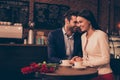 Happy romantic couple sitting in a cafe drinking coffee Royalty Free Stock Photo