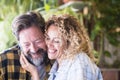 Happy romantic couple smiling and hugging each other with love. Close up of romantic couple spending leisure time outdoors. Happy Royalty Free Stock Photo