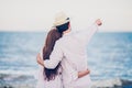 Happy Romantic Couples lover holding hands together walking on the beach Royalty Free Stock Photo