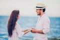 Happy Romantic Couples lover holding hands together walking on the beach Royalty Free Stock Photo