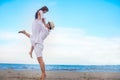 Happy Romantic Couples lover holding hands together walking on the beach Royalty Free Stock Photo