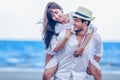 Happy Romantic Couples lover holding hands together walking on the beach Royalty Free Stock Photo