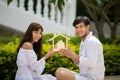 Happy Romantic Couples lover talking and drinking wine while having a picnic Royalty Free Stock Photo