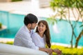 Happy Romantic Couples lover talking and drinking wine while having a picnic Royalty Free Stock Photo