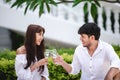 Happy Romantic Couples lover talking and drinking wine while having a picnic at home Royalty Free Stock Photo