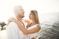 Happy romantic fashion couple in love have fun on beautiful sea at summer day Royalty Free Stock Photo