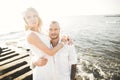 Happy romantic fashion couple in love have fun on beautiful sea at summer day Royalty Free Stock Photo