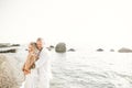 Happy romantic fashion couple in love have fun on beautiful sea at summer day Royalty Free Stock Photo