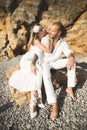 Happy romantic fashion couple in love have fun on beautiful sea at summer day Royalty Free Stock Photo