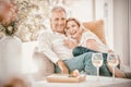 Happy romantic mature couple sitting on armchair Royalty Free Stock Photo