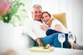 Happy romantic mature couple sitting on armchair Royalty Free Stock Photo