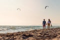 Happy Romantic Middle Aged Couple Enjoying Beautiful Sunset Walk on the Beach Royalty Free Stock Photo