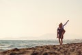 Happy Romantic Middle Aged Couple Enjoying Beautiful Sunset Walk on the Beach Royalty Free Stock Photo