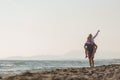 Happy Romantic Middle Aged Couple Enjoying Beautiful Sunset Walk on the Beach