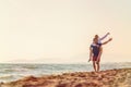 Happy Romantic Middle Aged Couple Enjoying Beautiful Sunset Walk on the Beach Royalty Free Stock Photo